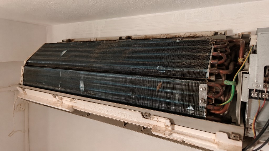 Very dirty split unit before professional cleaning.