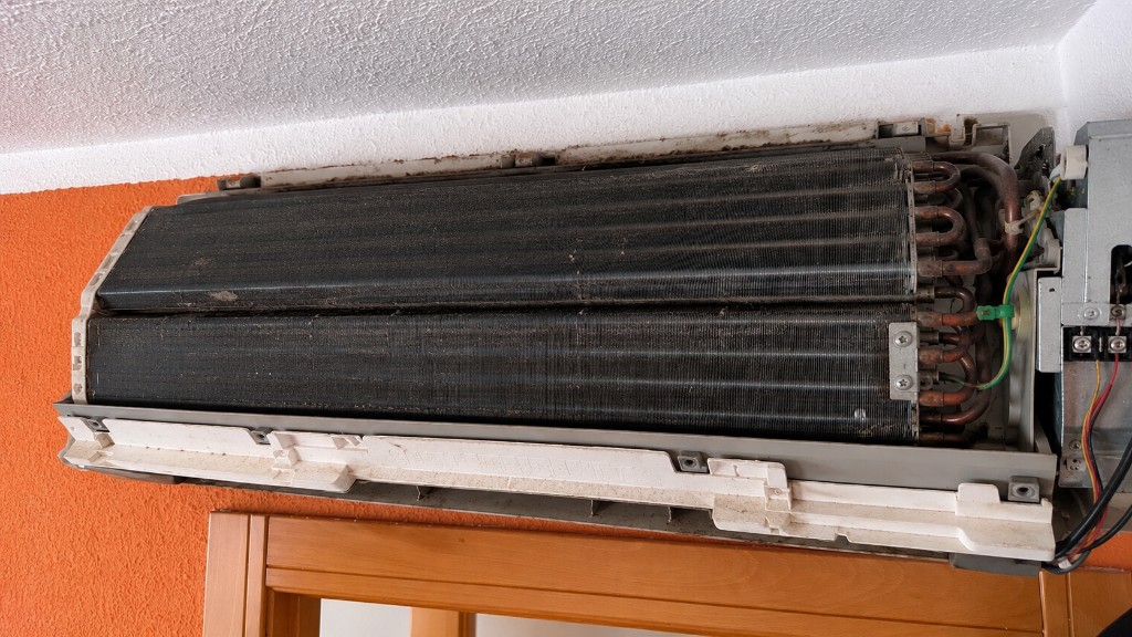 Evaporator with heavy buildup (before).